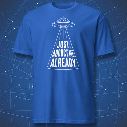 Royal blue t-shirt with clean sci-fi UFO beam and “Just Abduct Me Already” print