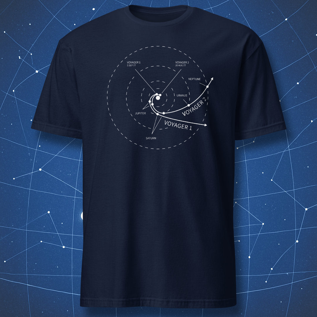 Navy t-shirt with minimalist Voyager mission map showing Voyager 1 and Voyager 2 paths through the outer Solar System.