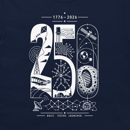 A navy blue t-shirt featuring a white graphic print of the number 250, decorated with space-themed illustrations such as a satellite, moon, rocket, and circuitry, with the text '1776-2026', 'BUILT. TESTED. LAUNCHED.'.