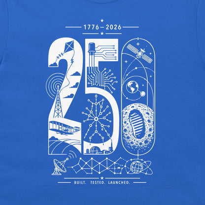 A close-up of a royal blue t-shirt, featuring a white graphic print celebrating the year 2026 with space and technology motifs.