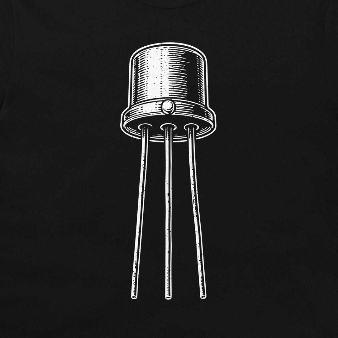 A close-up of a black t-shirt, featuring a white line-art graphic of an electronic transistor component.