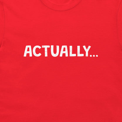 A close-up of a bright red t-shirt featuring the word 'ACTUALLY...'