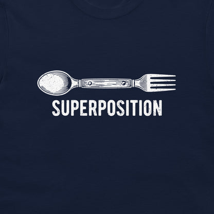 A close-up of a navy blue t-shirt featuring a white graphic of a spoon fused with a fork, with the word 'SUPERPOSITION' printed below in a distressed white font.