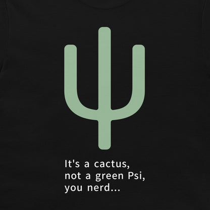 A close-up of a black t-shirt featuring a light green cactus graphic and the white printed text 'It's a cactus, not a green Psi, you nerd.