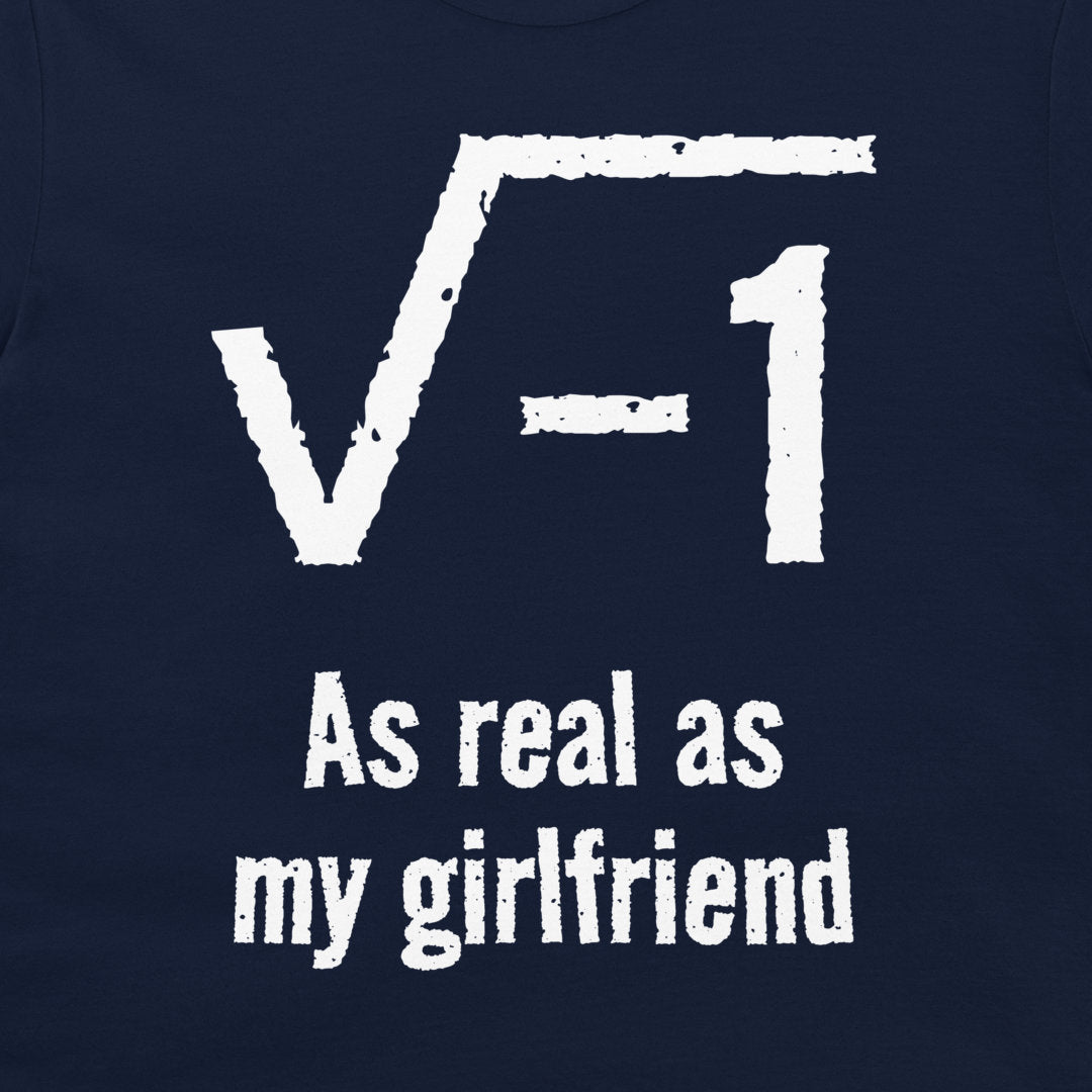 A close-up of a navy blue t-shirt, featuring a white distressed graphic of the square root of -1 with the text 'As real as my girlfriend' printed below.