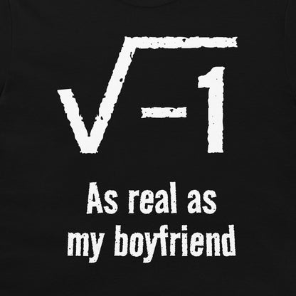 A close-up of a black t-shirt, featuring a white distressed graphic of the square root of negative one with the text 'As real as my boyfriend' underneath.