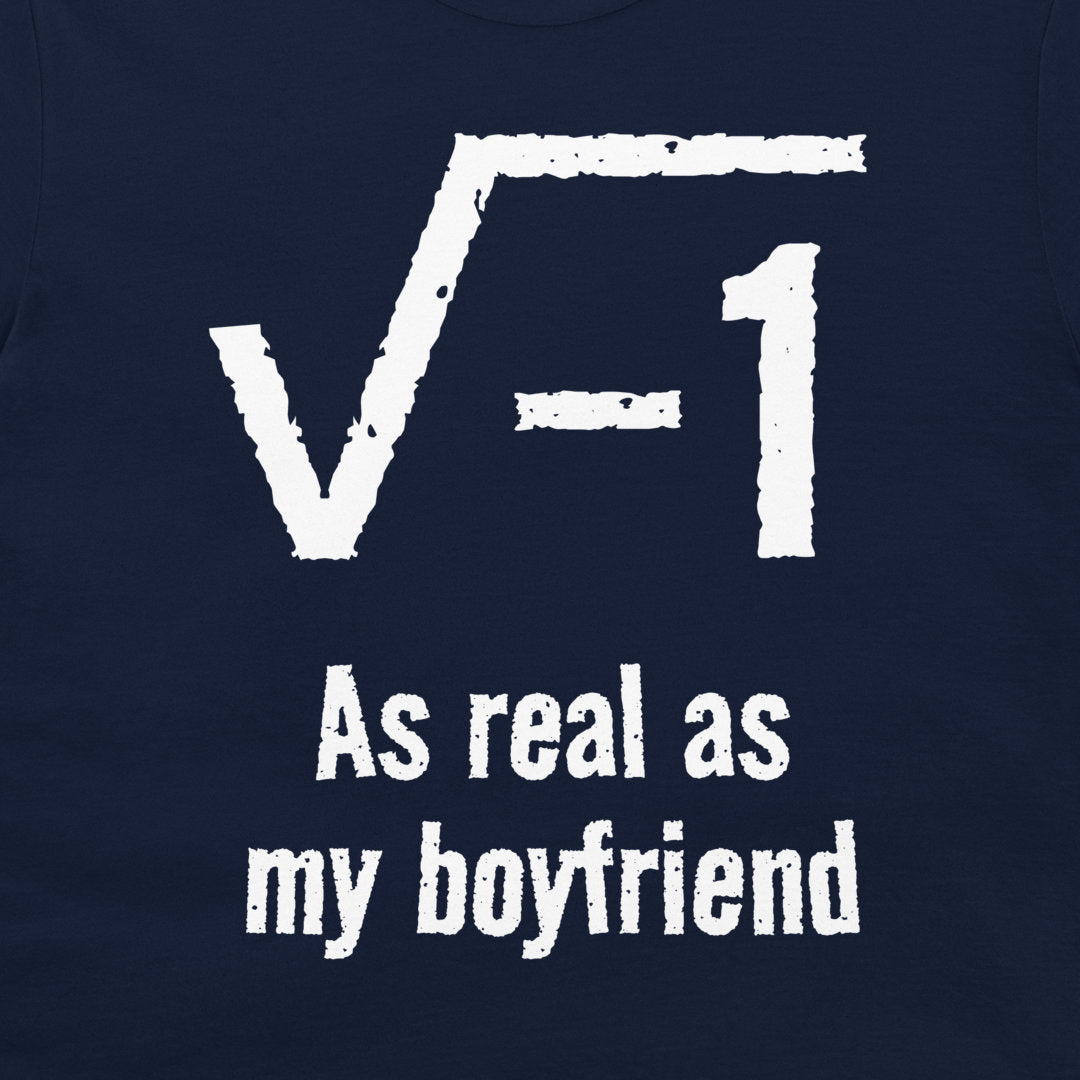 A close-up of a navy blue t-shirt, featuring a white distressed graphic of the square root of -1 with the text 'As real as my boyfriend' underneath.