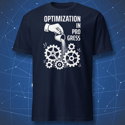 Navy t-shirt with white Optimization In Progress engineering humor graphic of sand poured into cogs.