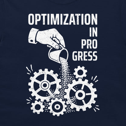 A navy blue graphic print on a t-shirt featuring a white distressed design with the text 'OPTIMIZATION IN PROGRESS' and gears being poured over with sand.