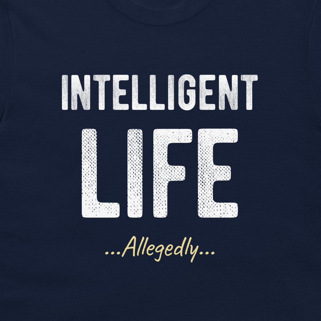 A close-up of a navy blue t-shirt featuring a white graphic print that reads 'INTELLIGENT LIFE ...Allegedly...' in stylized fonts.