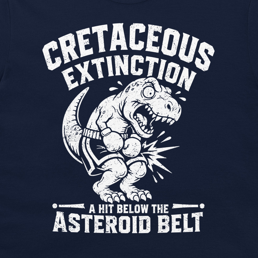 Close-up of a cretaceous extinction T-shirt with white T. rex boxer graphic and asteroid belt joke on navy blue shirt.