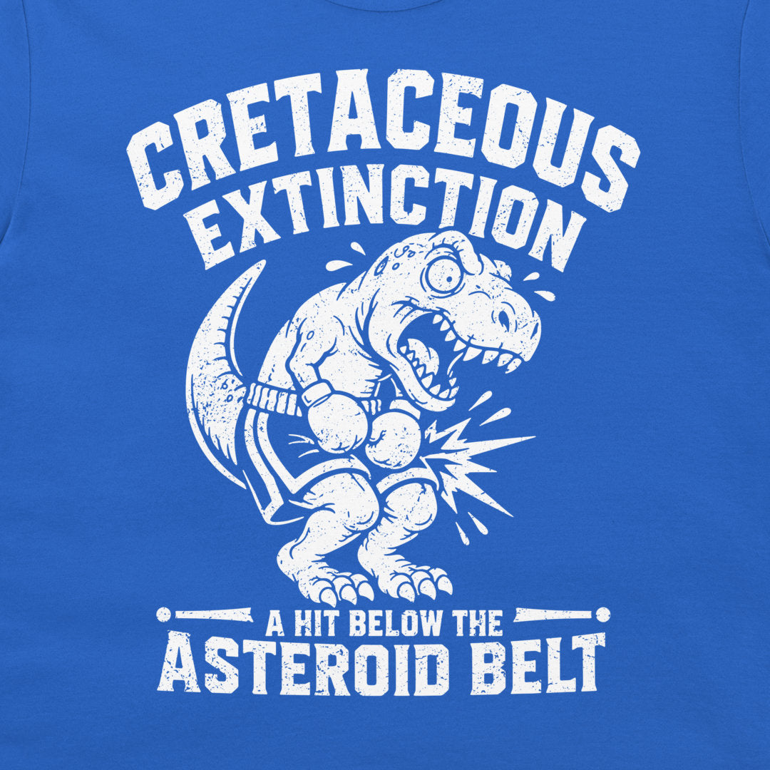 Close-up of a cretaceous extinction T-shirt with white T. rex boxer graphic and asteroid belt joke on royal blue shirt.
