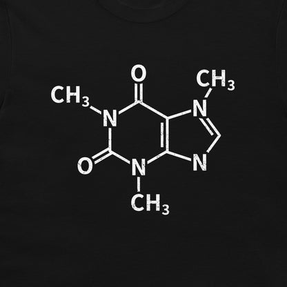 A close-up of a caffeine molecule structure graphic printed on a black T-shirt