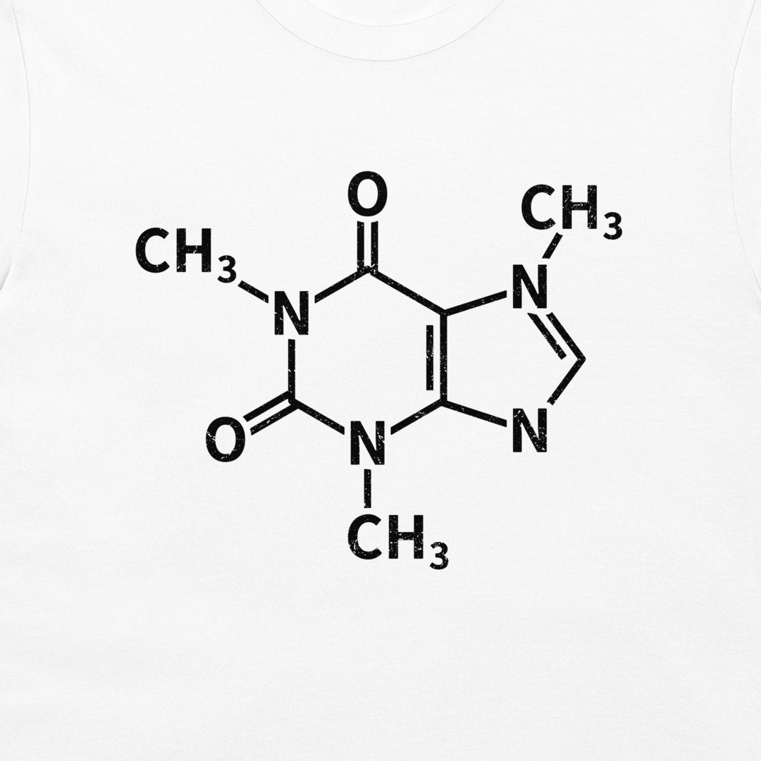 A close-up of a caffeine molecule structure graphic printed on a white T-shirt