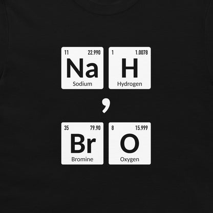 A close-up of a black t-shirt, featuring a white graphic print of four periodic table element tiles spelling out 'Na H Br O' separated by a large semicolon symbol.