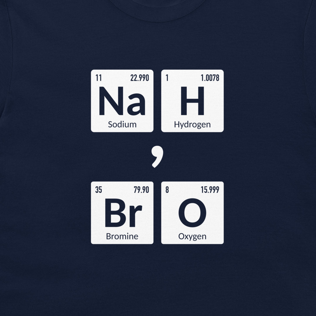 A close-up of a navy blue t-shirt featuring a graphic design that spells out 'NaBrO' using periodic table style tiles for Sodium, Bromine, Hydrogen, and Oxygen, separated by a large white comma.