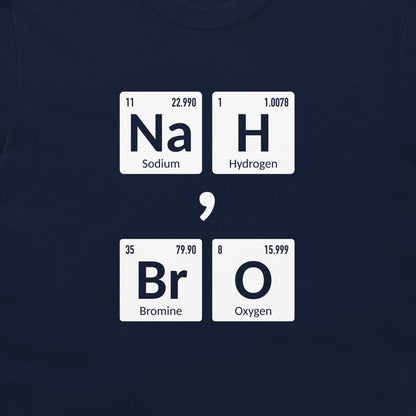 A close-up of a navy blue t-shirt featuring a graphic design that spells out 'NaBrO' using periodic table style tiles for Sodium, Bromine, Hydrogen, and Oxygen, separated by a large white comma.