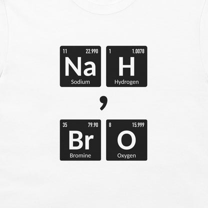A white crewneck t-shirt featuring a graphic print of four black periodic table style tiles spelling out 'Na H Br O' separated by a black comma symbol, representing the salt sodium bromide.