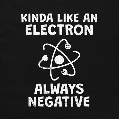 A close-up of a black t-shirt, featuring a distressed white graphic print that reads 'KINDA LIKE AN ELECTRON ALWAYS NEGATIVE' with a stylized atom illustration.