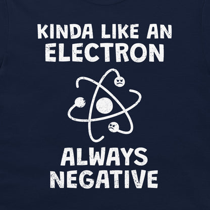 A close-up of a navy blue shirt or fabric featuring a white distressed graphic that reads 'KINDA LIKE AN ELECTRON ALWAYS NEGATIVE' with an atom symbol and small sad electrons