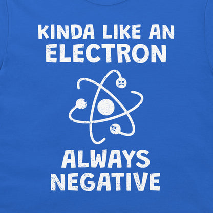 A close-up of a blue T-shirt with a white distressed graphic that reads 'KINDA LIKE AN ELECTRON ALWAYS NEGATIVE' around an atom symbol.