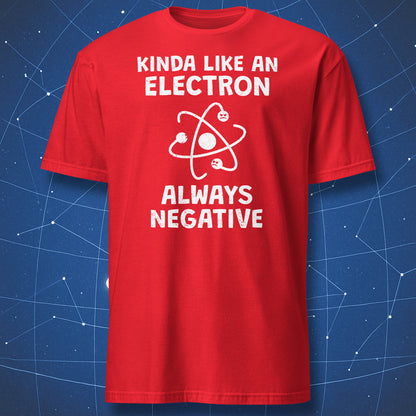 Red t-shirt with white physics humor design featuring the phrase “Kinda Like An Electron Always Negative” and a grumpy atom graphic.