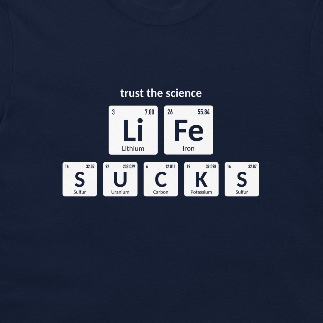 Close-up of Trust the Science Life Sucks chemistry design on navy T-shirt