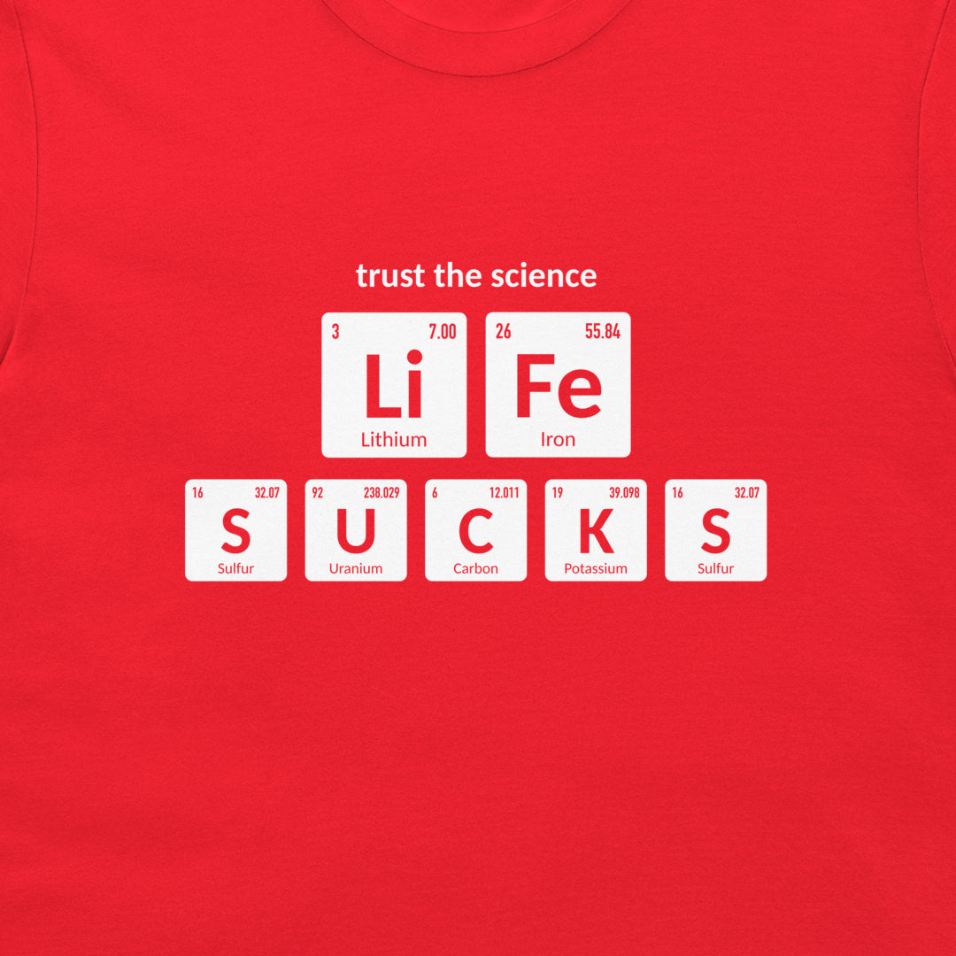 Close-up of Trust the Science Life Sucks chemistry design on red T-shirt