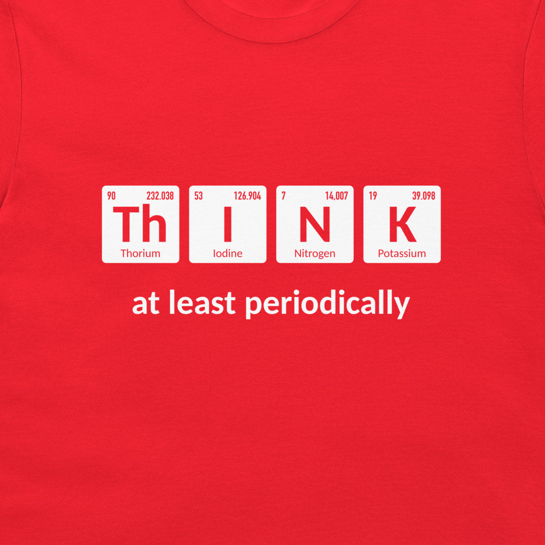 Close-up of white periodic table THINK design printed on a red T-shirt