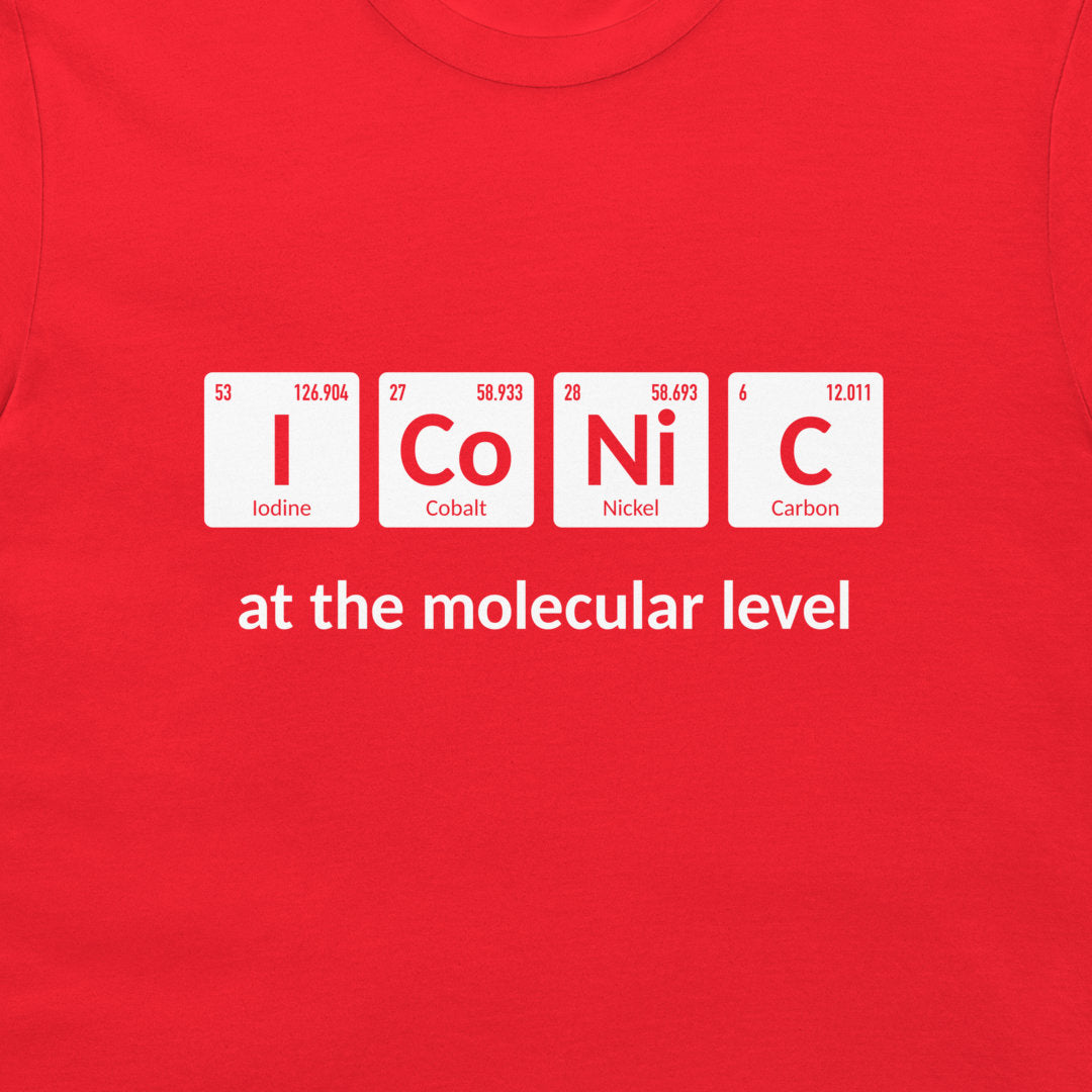 Close-up of the I Co Ni C periodic table pun printed in white on a red T-shirt