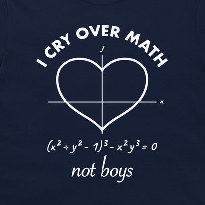 Close-up of I Cry Over Math Not Boys heart equation design printed in white on a navy T-shirt