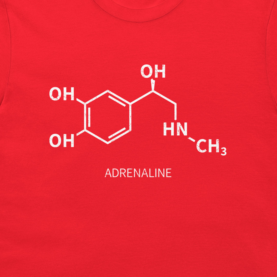 Close-up of adrenaline molecular structure printed in white on a red T-shirt
