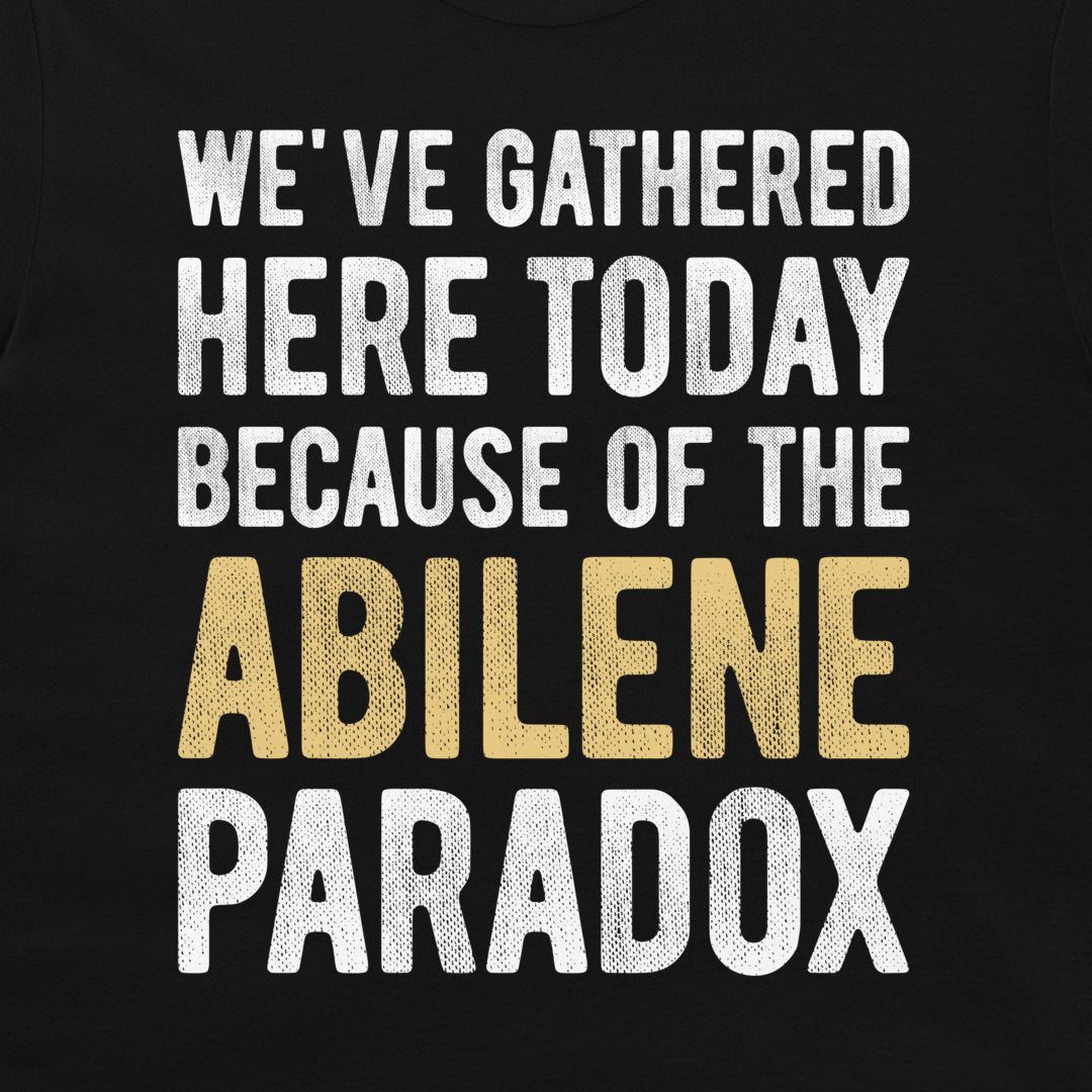 Close-up of Abilene Paradox psychology humor design printed on a black T-shirt