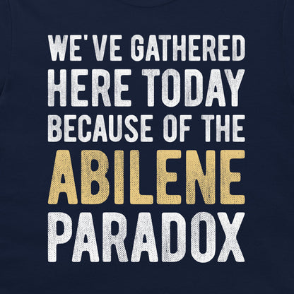 Close-up of Abilene Paradox groupthink humor design printed on a navy T-shirt