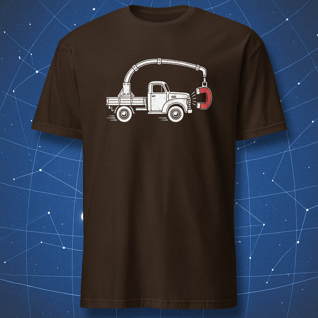 Dark chocolate physics T-shirt featuring a white vintage truck pulled by its own red horseshoe magnet