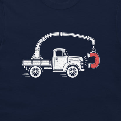 Close-up of the perpetual motion truck and red magnet graphic on a navy T-shirt