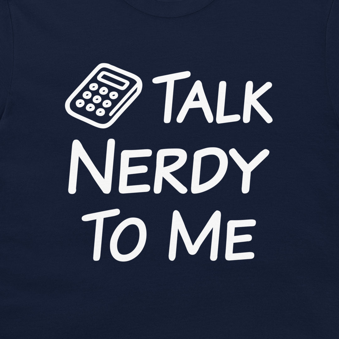 Close-up of the white Talk Nerdy to Me calculator design on a navy T-shirt