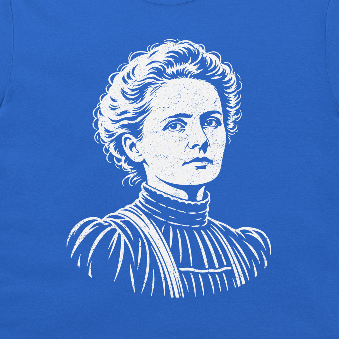 Close-up of the white Marie Curie portrait on a Royal Blue T-shirt.