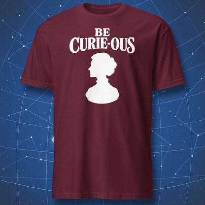Maroon Be Curie-ous T-shirt with white lettering and a Marie Curie profile silhouette.