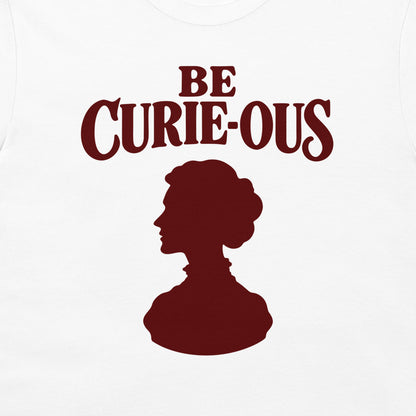 Close-up of the burgundy Be Curie-ous design on a white T-shirt.