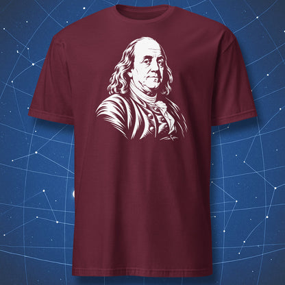 Maroon T-shirt with a white engraved portrait of Benjamin Franklin