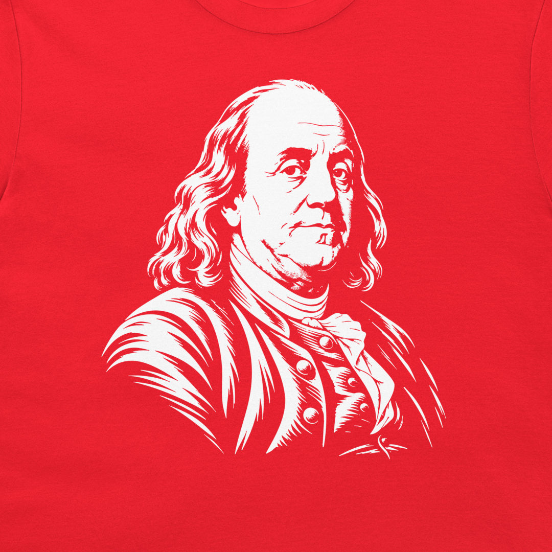 Close-up of the Benjamin Franklin portrait on a red T-shirt