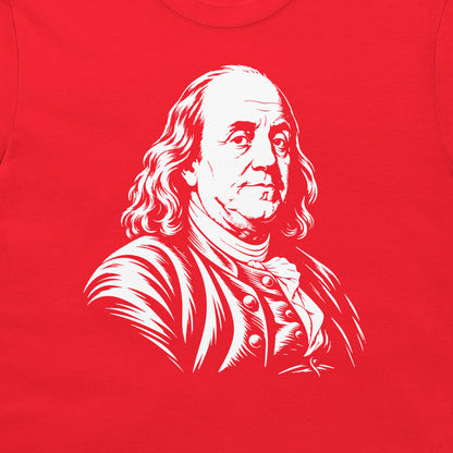 Close-up of the Benjamin Franklin portrait on a red T-shirt
