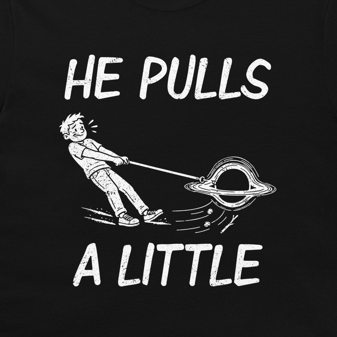 Close-up of distressed white He Pulls a Little lettering and a leashed black hole dragging its owner on black fabric.