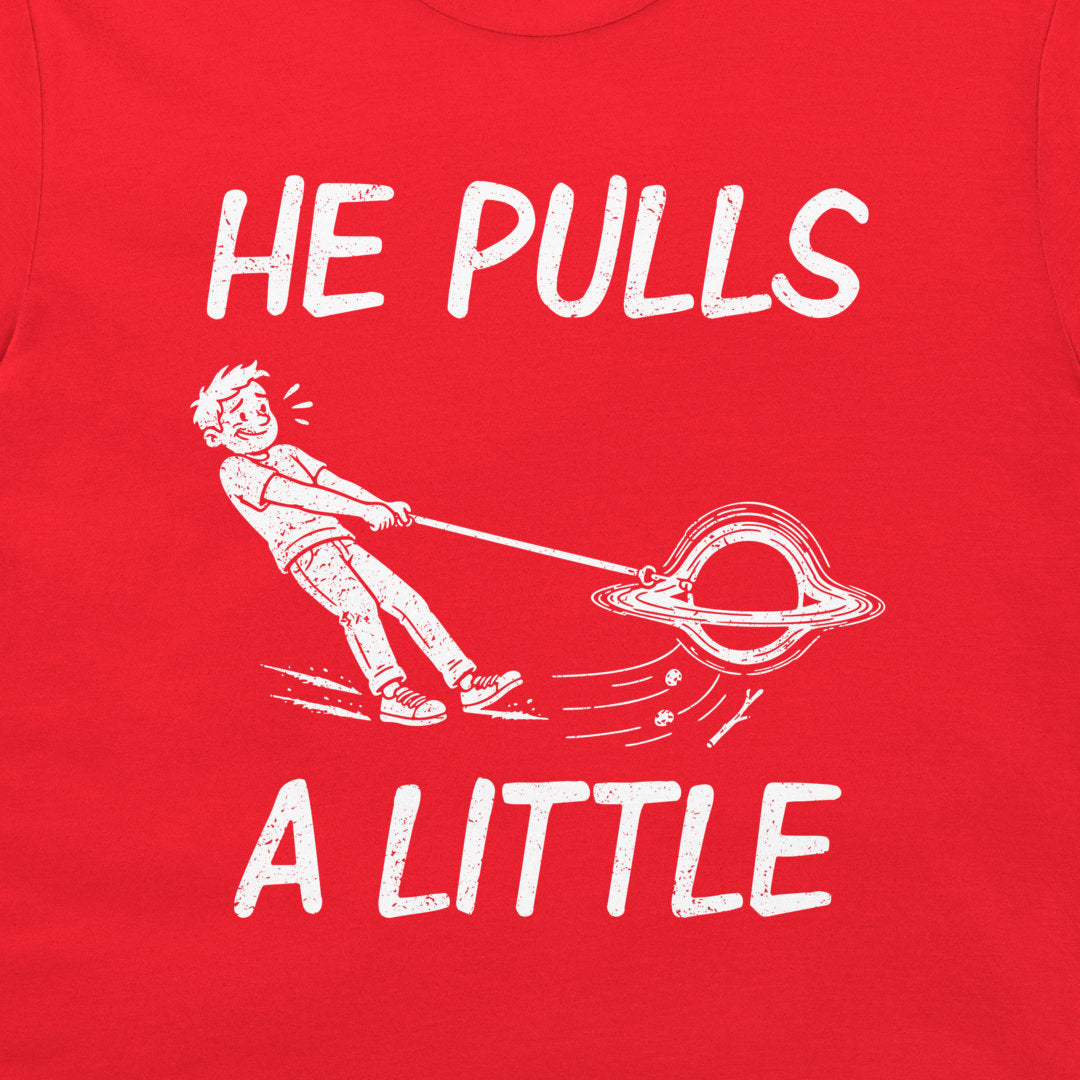 Close-up of distressed white He Pulls a Little lettering and the black-hole walking cartoon printed on red fabric.