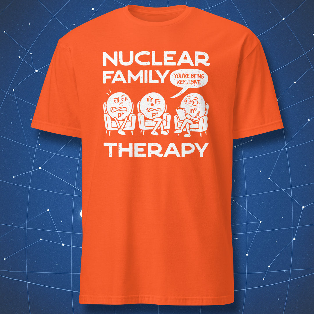 Orange Nuclear Family Therapy T-shirt featuring a white cartoon of two protons and a neutron in a therapy session.