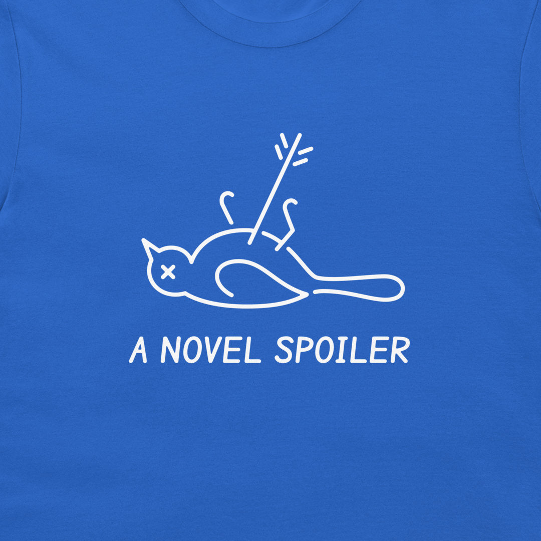 Close-up of the white belly-up bird, arrow, and “A NOVEL SPOILER” text on a royal blue T-shirt.