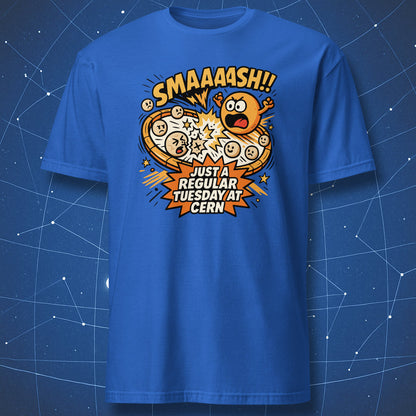 Royal blue T-shirt showing colorful comic-style particle explosion and the caption “SMAAASH!! Just a regular Tuesday at CERN” — funny physics design.