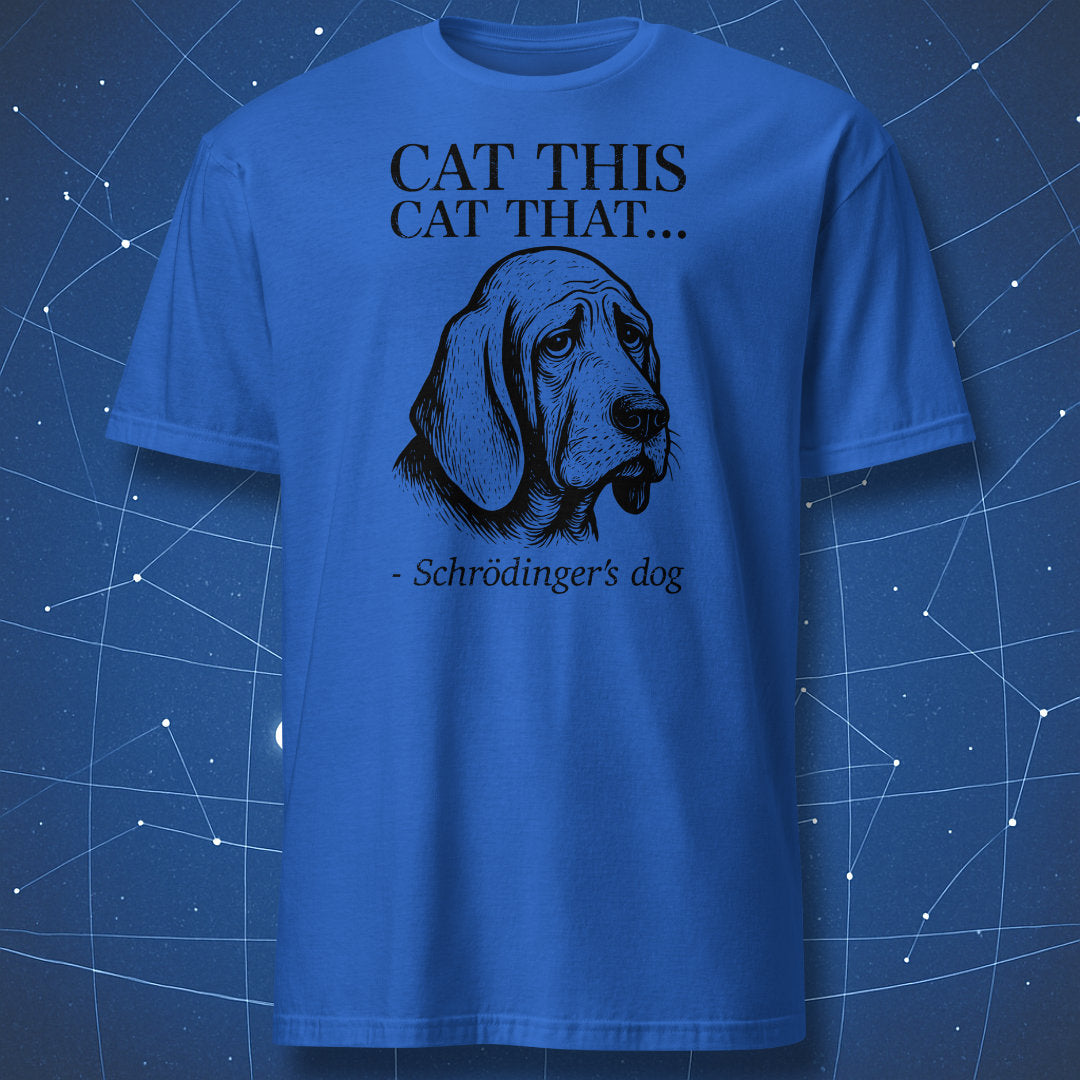 Royal blue T-shirt featuring a white outline of a melancholic dog saying “Cat this, cat that… – Schrödinger’s dog” — nerdy science joke shirt.