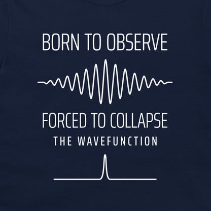 Close-up of the quantum wave packet and collapsed state graphic on a navy T-shirt